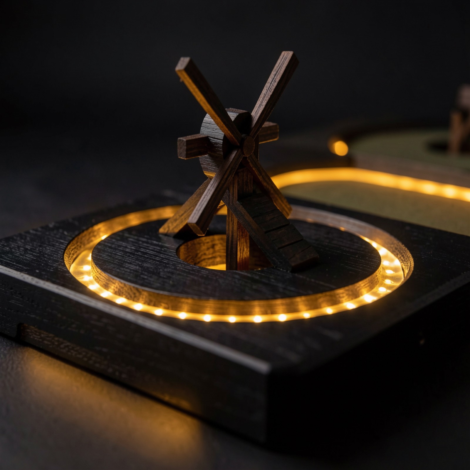 LED-lit hand-built mini golf obstacle